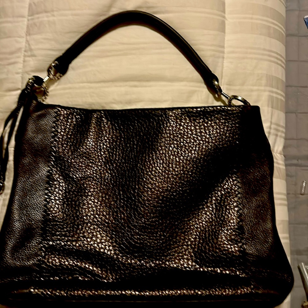 O smell the leather. Brighton. Lovely brown bag